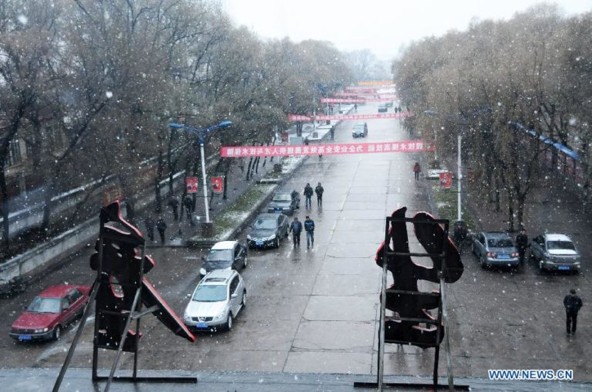 Snowy urban street reproduced in The Greg Zone report
