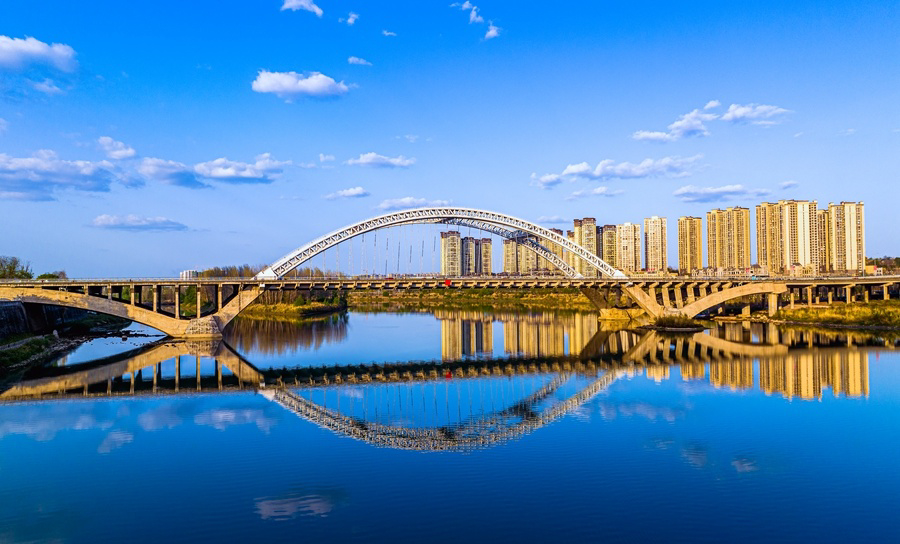 Ziyang riverfront bridge used as a representative city scene for the Outlook Oriental Weekly interview
